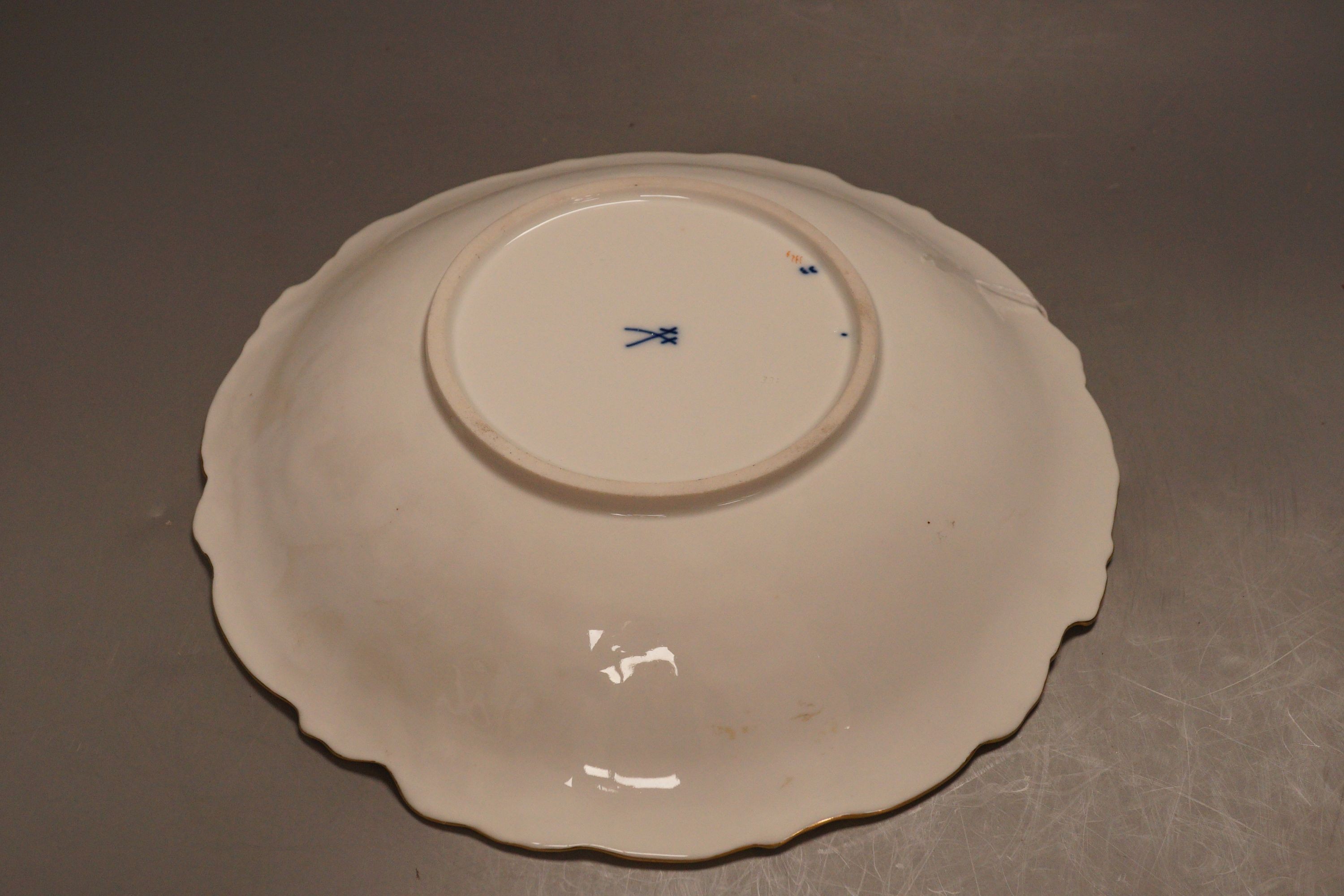 An early 20th Meissen century gilt floral blue and white dish, 27.5cm diameter